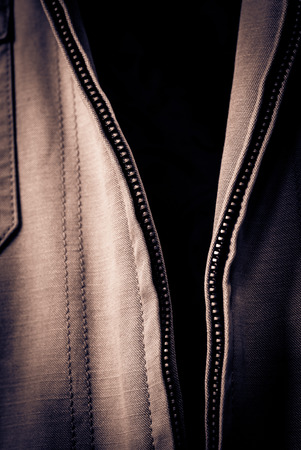 Open Jacket Zipper Pull Detail, Textured Textileの写真素材