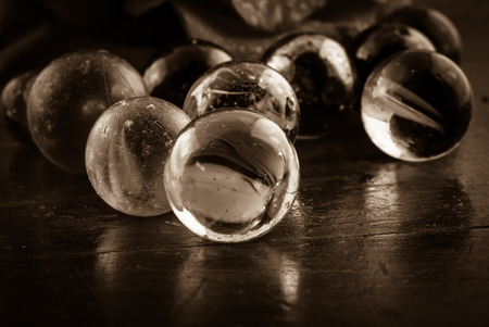 Toy marbles abstract on the old table imageの写真素材