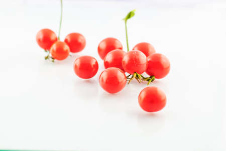 Cherry tomatoes isolated on white background imageの写真素材