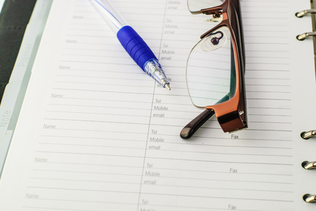 Ballpoint pen on paper waiting for someone to start writingの写真素材