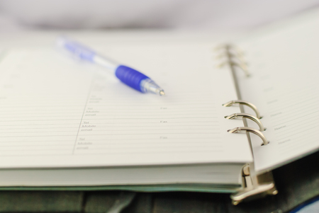 Ballpoint pen on paper waiting for someone to start writingの写真素材