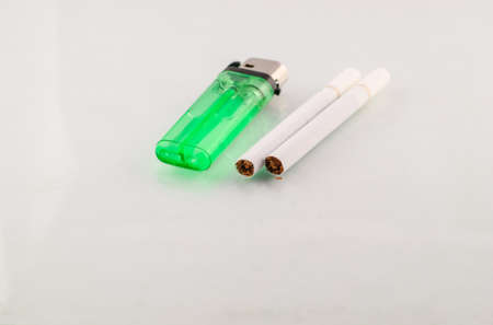 Two cigarette isolated on a white background.の写真素材