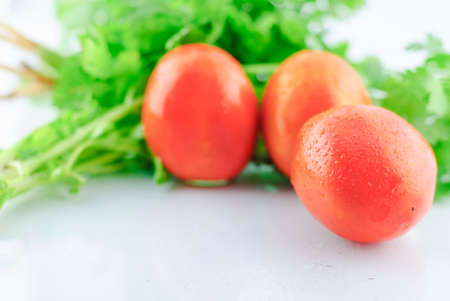 Fresh Ripe Tomatoes isolated on white backgroundの写真素材
