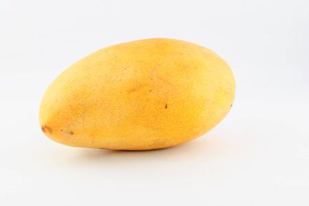 fresh yellow  mango isolated on white backgroundの写真素材