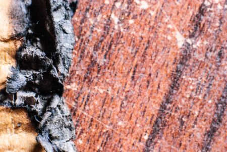 Very old creased paper with fire damaged and burned edgesの写真素材