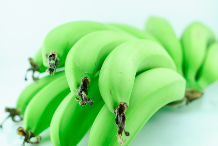 Bunch Green banana isolated on white backgroundの写真素材