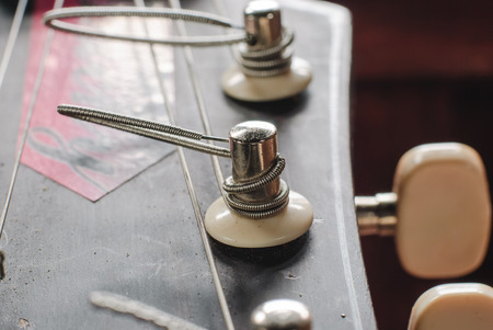 Side of old acoustic guitar, Obviously shallowの写真素材