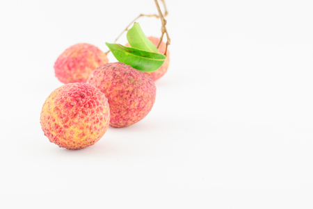 Red Litchi fruit isolated on white backgroundの写真素材