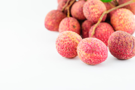 Red Litchi fruit isolated on white backgroundの写真素材