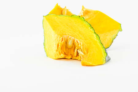 Piece of pumpkin isolated on white backgroundの写真素材