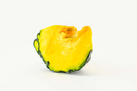 Piece of pumpkin isolated on white backgroundの写真素材