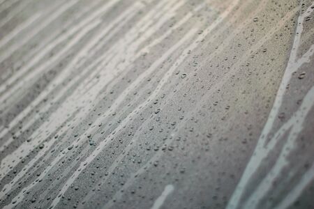 Natural water drop on the glass textureの写真素材