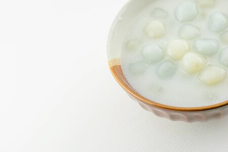 Dumplings in coconut cream (Bua Loi) on Thai silk Dessert of Thailand.の写真素材