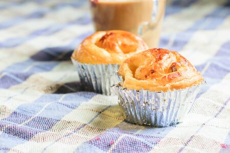 breakfast coffee with homemade bread on tableの写真素材