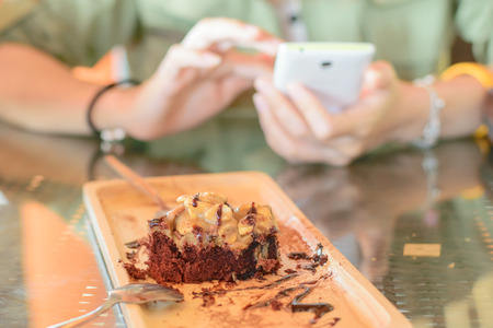 Delicious chocolate cakes on table close-upの写真素材