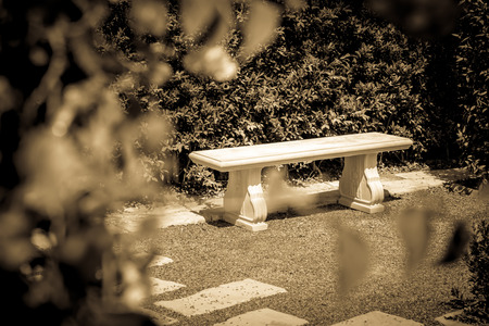 Chair Stone on Garden and wall stone groundの写真素材