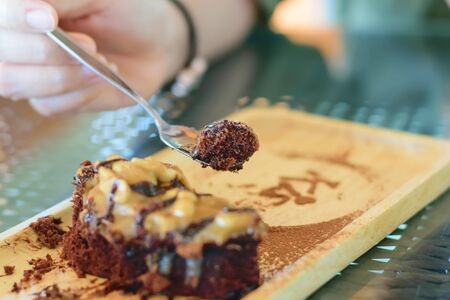 Delicious chocolate cakes on table close-upの写真素材