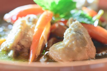 Thai food style in green curry chickenの写真素材