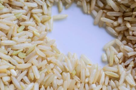 Closeup view of few white rice grains.の写真素材