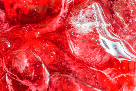 Glass of cold roselle juice - healthy food against woodの写真素材