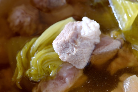 pickled Chinese cabbage with pork and bone soup in bowlの写真素材