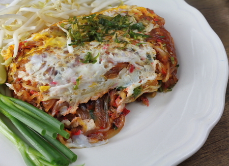 Fried noodle Thai style with fried egg is deliciousの写真素材