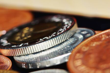 Golden coin and old coin stacking, golden coin and old coinの写真素材