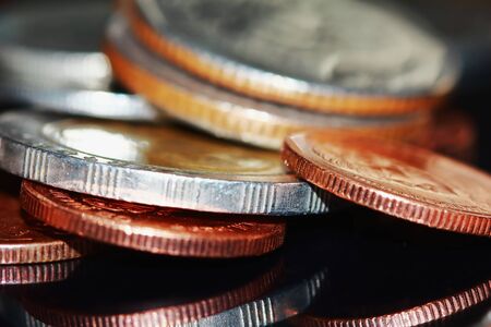 Golden coin and old coin stacking, golden coin and old coinの写真素材