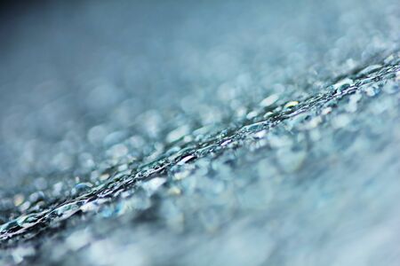 fresh raindrop in nature on clean glass for background