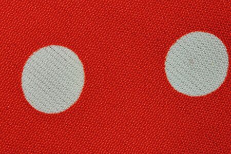 beautiful red color texture of cloth in abstract macro for background