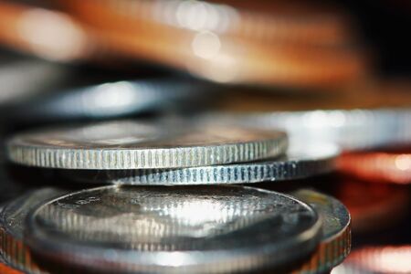 Golden coin and old coin stacking, golden coin and old coinの写真素材