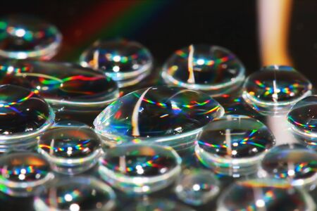 reflection of dropet on cd in macro for backgroundの写真素材