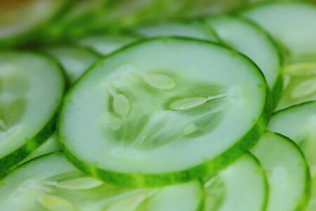 fresh slice cucumber vegetable in macro for backgroundの写真素材