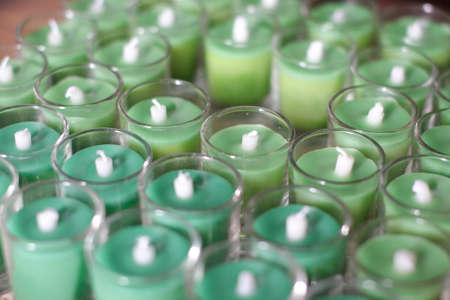 Candles in a glassの写真素材