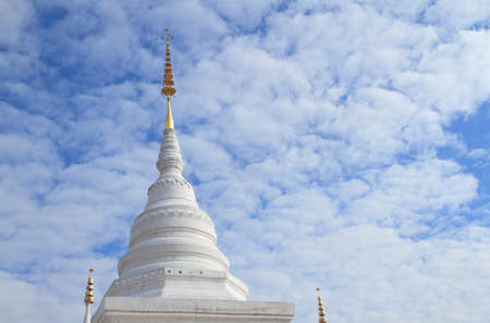 stupa at noon under blue sky Backgroundの写真素材