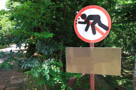 The sign "Do not collect flowers" in national park in Thailand.の写真素材