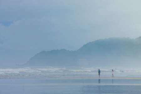 Beach and morning mist,thailandの写真素材