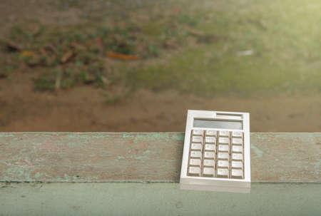 The calculator is located on the Cement.の写真素材