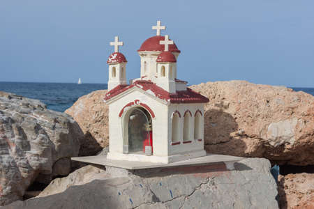 Small chapel in the harbor of Kalamaki, Chania, Creteの写真素材