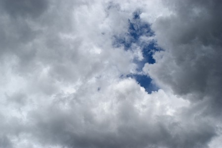 Partly cloudy overcast and rain will fall.の写真素材