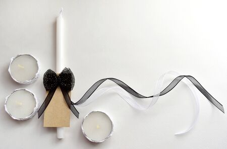  White candles and cards empty space for text.の写真素材