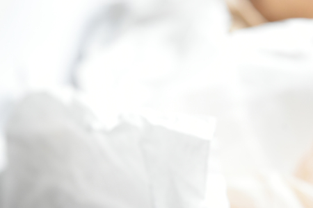 Background blurred white and brown tissues and empty space for text.の写真素材