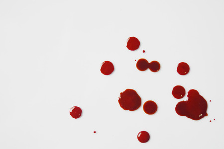 Top view of blood red Spread on white ground.の写真素材