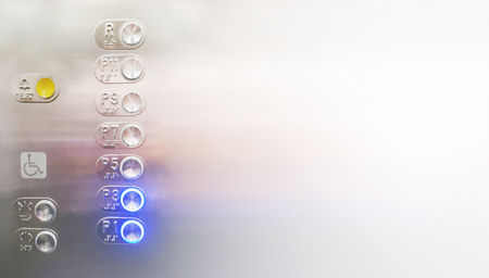 Control buttons interior elevator have braille panel for the disabled and empty right space for text...