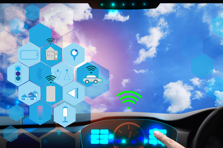 Internal view and automatic self command driving  with smartphone , Electric smart car technology and empty space for text.の写真素材