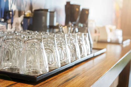 empty cup on coffee break zone in office  with morning sunlight.selective focusの写真素材