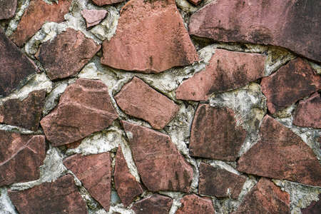 background of textured stones on wall