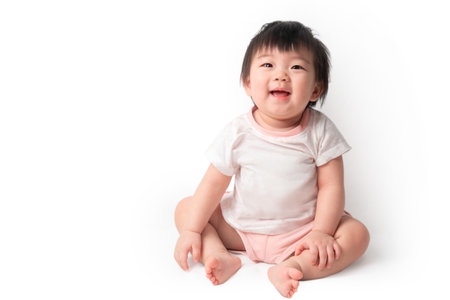 Asian baby girl sitting in car seat chair, Her have smile with happy time. Travel safely concept.