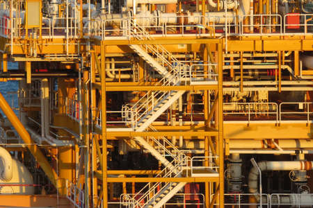 Offshore construction platform for production oil and gas, Oil and gas industry and hard work,Production platform and operation process by manual and auto function, oil and rig industry and operation.のeditorial素材