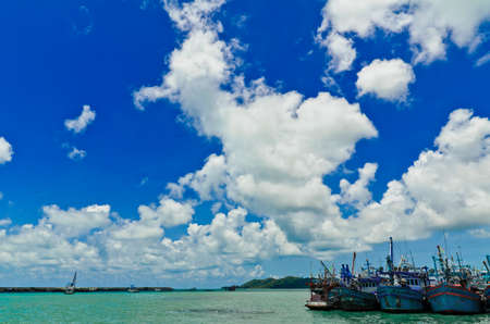 Fishing boat and cloud sea